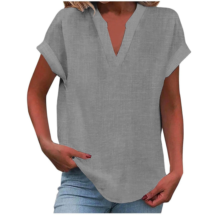 Comfortable relaxed-fit women's short-sleeve V-neck blouse, essential for a stylish wardrobe.