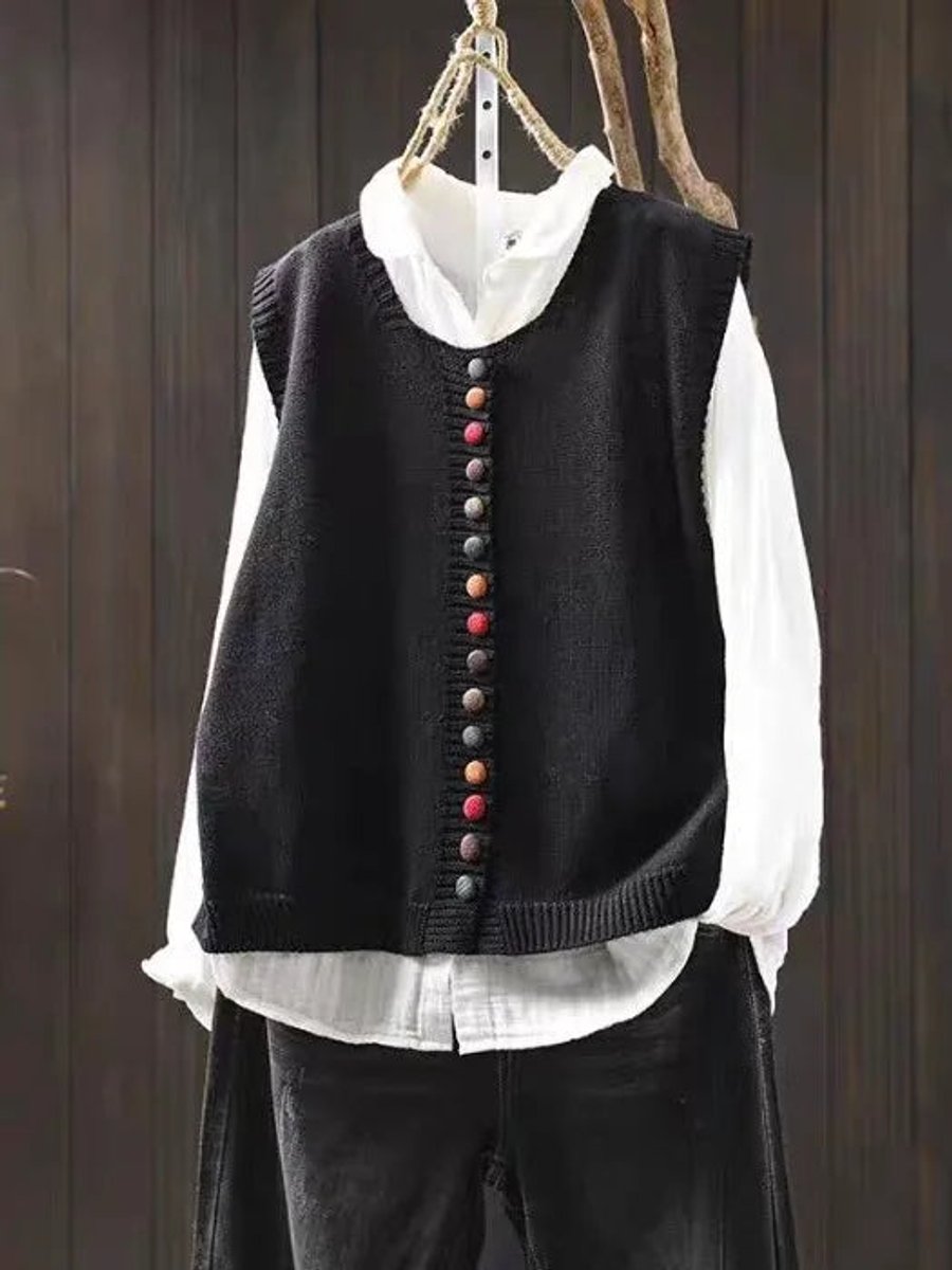 Comfortable women's round neck vest top. Relaxed fit, sleeveless & button-up, ideal for stylish casual layering.