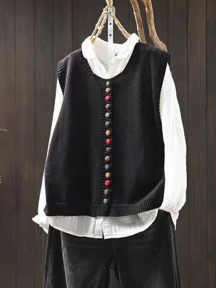 Comfortable women's round neck vest top. Relaxed fit, sleeveless & button-up, ideal for stylish casual layering.