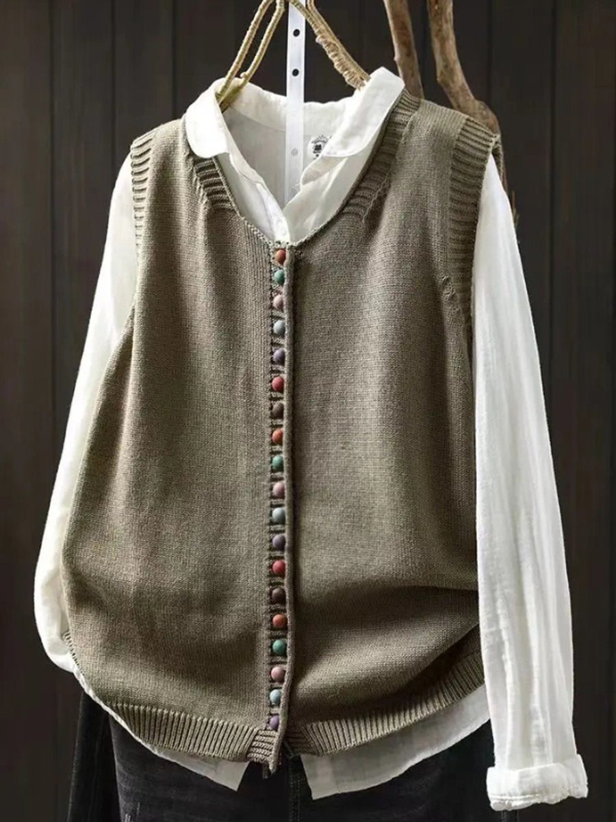 Women's relaxed sleeveless button-up vest for transitional fall fashion. Easy layering, comfort & casual style.