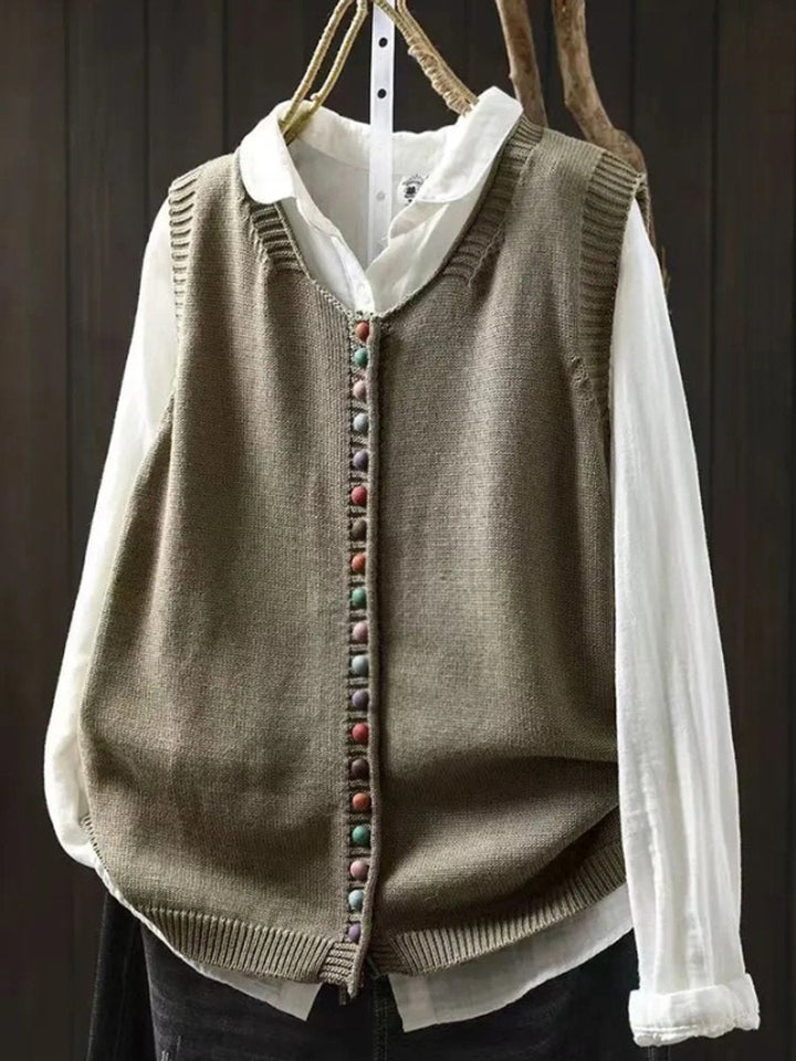 Women's relaxed sleeveless button-up vest for transitional fall fashion. Easy layering, comfort & casual style.