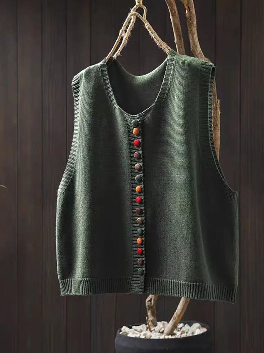 Stylish women's button-up sleeveless vest with a relaxed fit. Great for chic casual layering & modern fall looks.