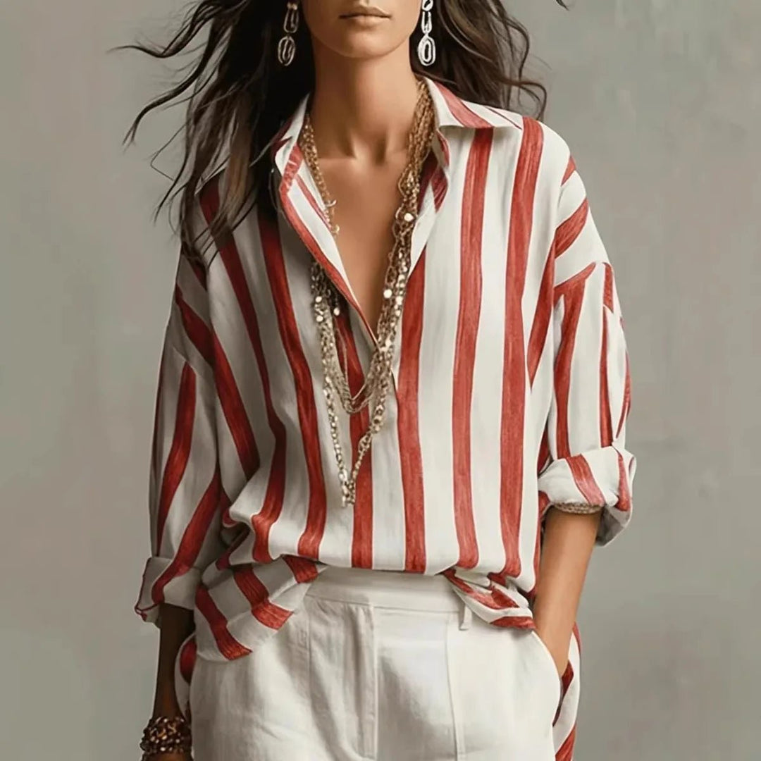 Striped long sleeve blouse for women, featuring a relaxed fit & collared design. A versatile, elegant smart casual top.
