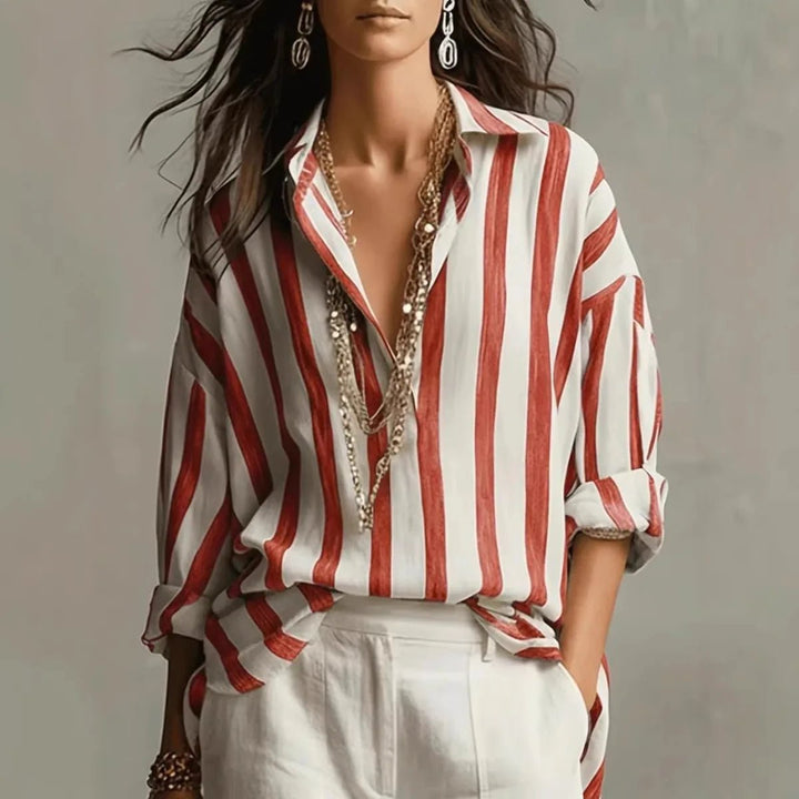 Striped long sleeve blouse for women, featuring a relaxed fit & collared design. A versatile, elegant smart casual top.