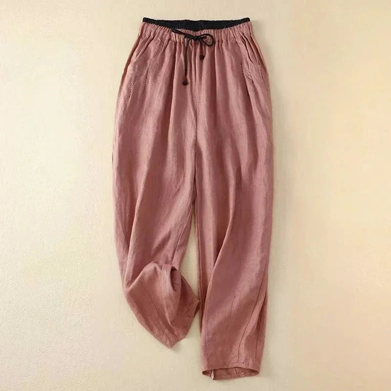 Effortless elegance: women's relaxed fit summer pants with drawstring elastic waist. Casual, comfortable, wide-leg style.