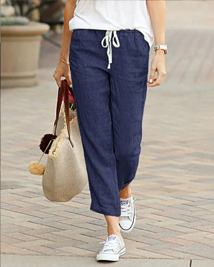 Comfortable women's casual trousers featuring a relaxed fit & drawstring waist, ideal for daily spring outfits.