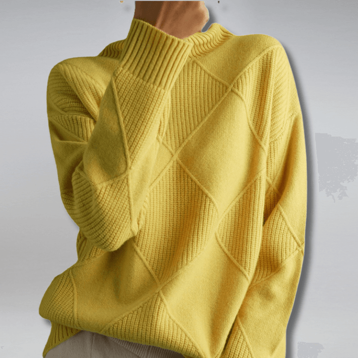 Women's relaxed fit turtleneck sweater, a cozy long sleeve design for elegant winter fashion.