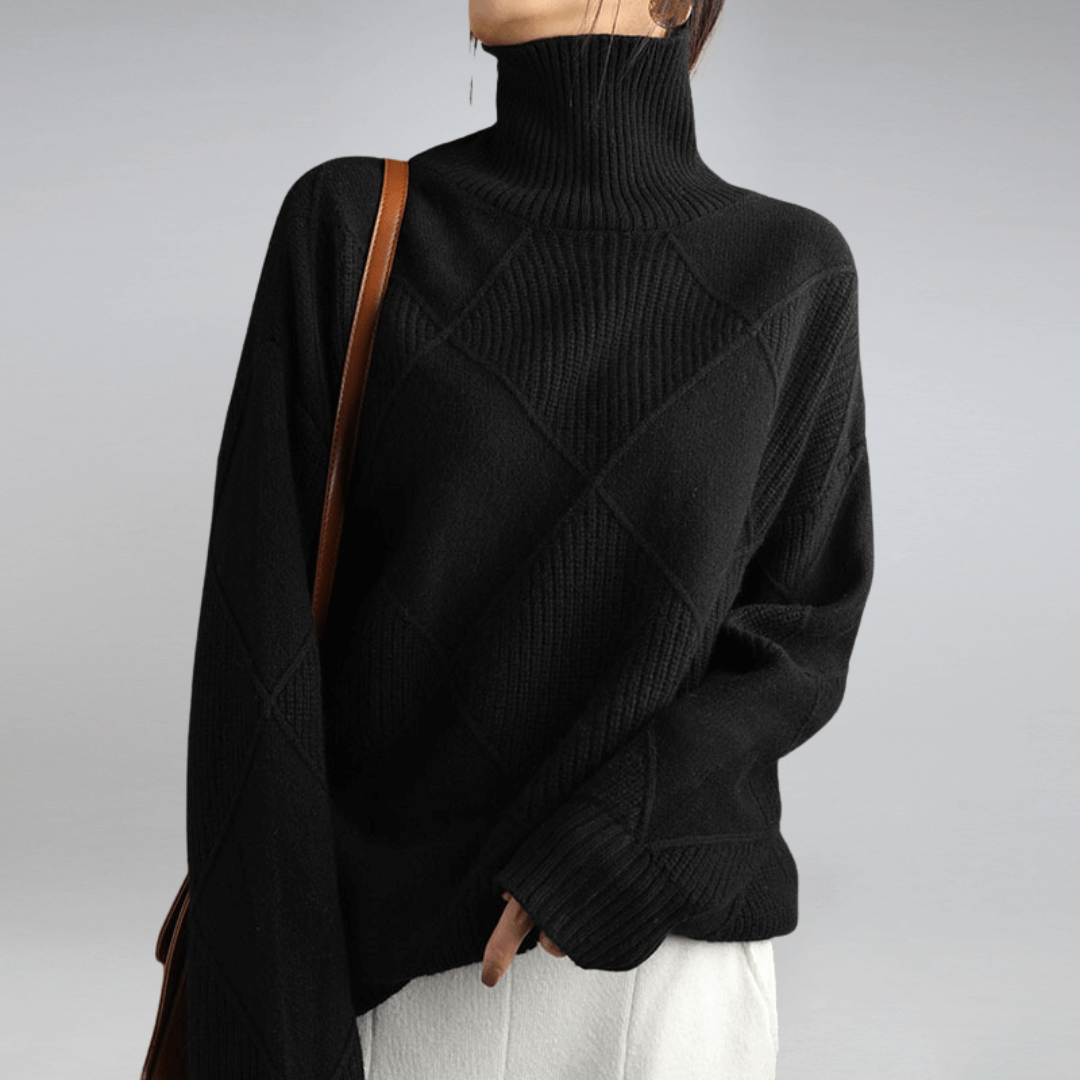 Soft women's long sleeve turtleneck, a relaxed fit sweater offering cozy winter elegance.