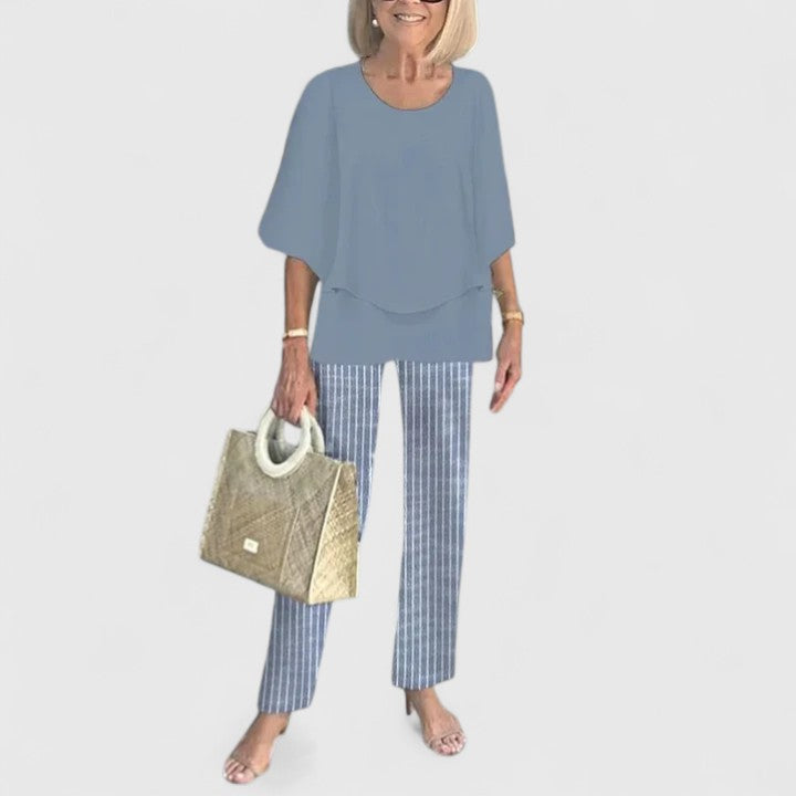 Back view of women's relaxed fit two-piece set with wide leg pants, offering chic and versatile style.