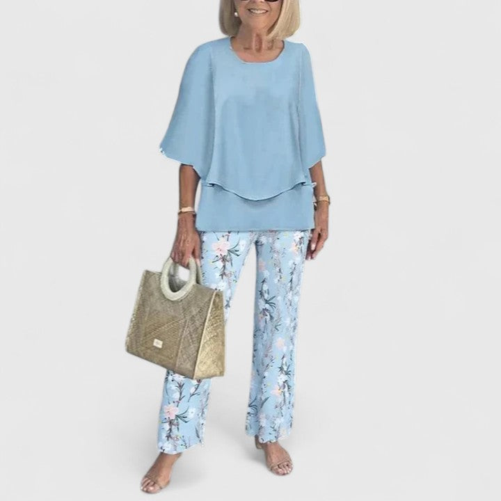 Folded women's relaxed fit two-piece pant set, ready for comfortable and stylish, versatile casual wear.