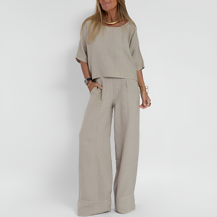 Women's relaxed fit two-piece set: comfortable short sleeve top & wide leg pants, perfect for casual summer loungewear.