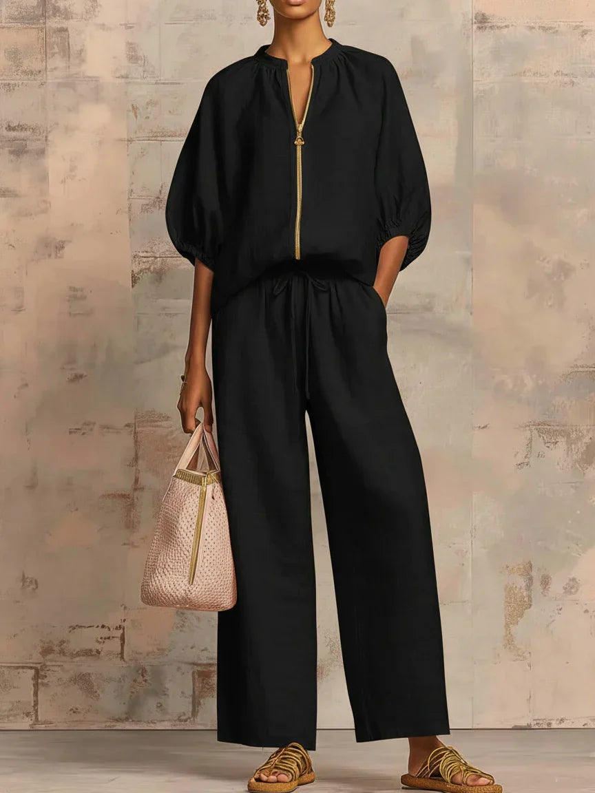 Versatile women's two-piece set: relaxed shirt and wide-leg trousers, ideal for casual, resort, or everyday summer fashion.