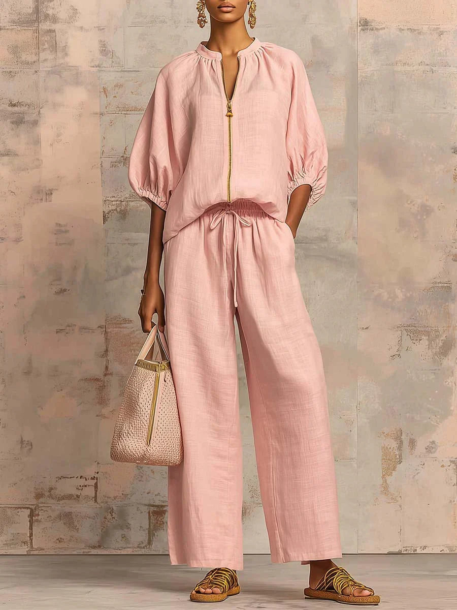 Effortless women's two-piece relaxed set: a chic button-up shirt and comfortable wide-leg trousers for summer style.