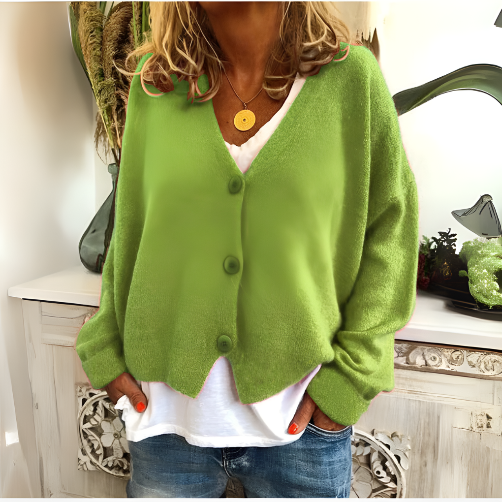 Cozy women's v-neck cardigan with a relaxed fit and button-front, ideal for comfortable casual layering.