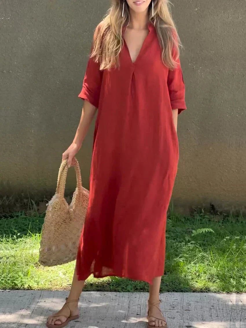Relaxed V-neck maxi dress in soft cotton linen for women. Comfortable, flowy, and stylish for summer or vacations.