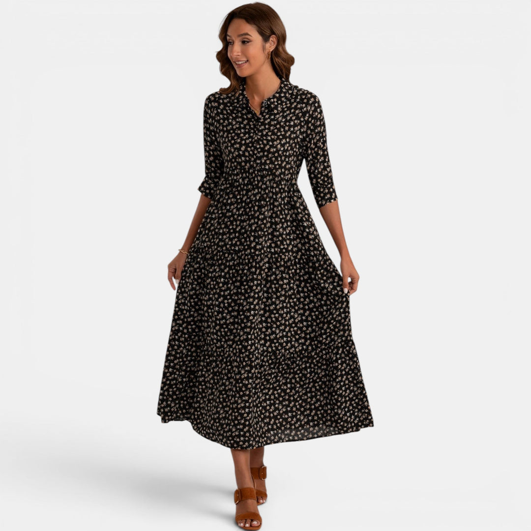 Beautiful flowy women's maxi dress with a colorful floral print and V-neck, spring style.