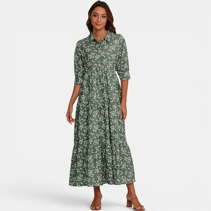 Back view of a comfortable women's floral print V-neck maxi dress, perfect for casual elegance.
