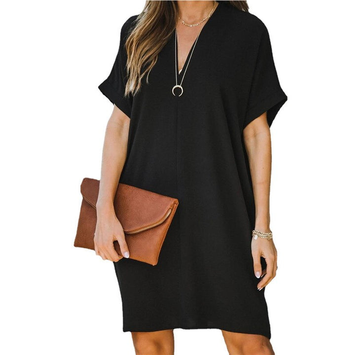 Casual women's short sleeve V-neck tunic dress. Loose fit, relaxed style, perfect as a summer day dress.