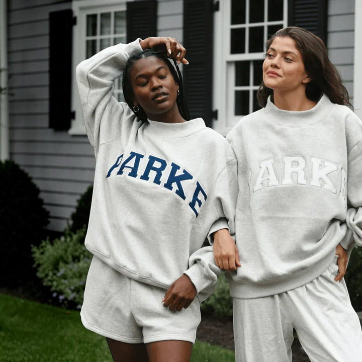 Comfortable loungewear: Women's relaxed fit varsity pullover hoodie.