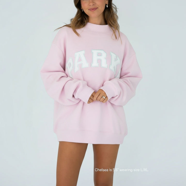 Comfortable women's varsity pullover, relaxed fit, ideal for everyday style.