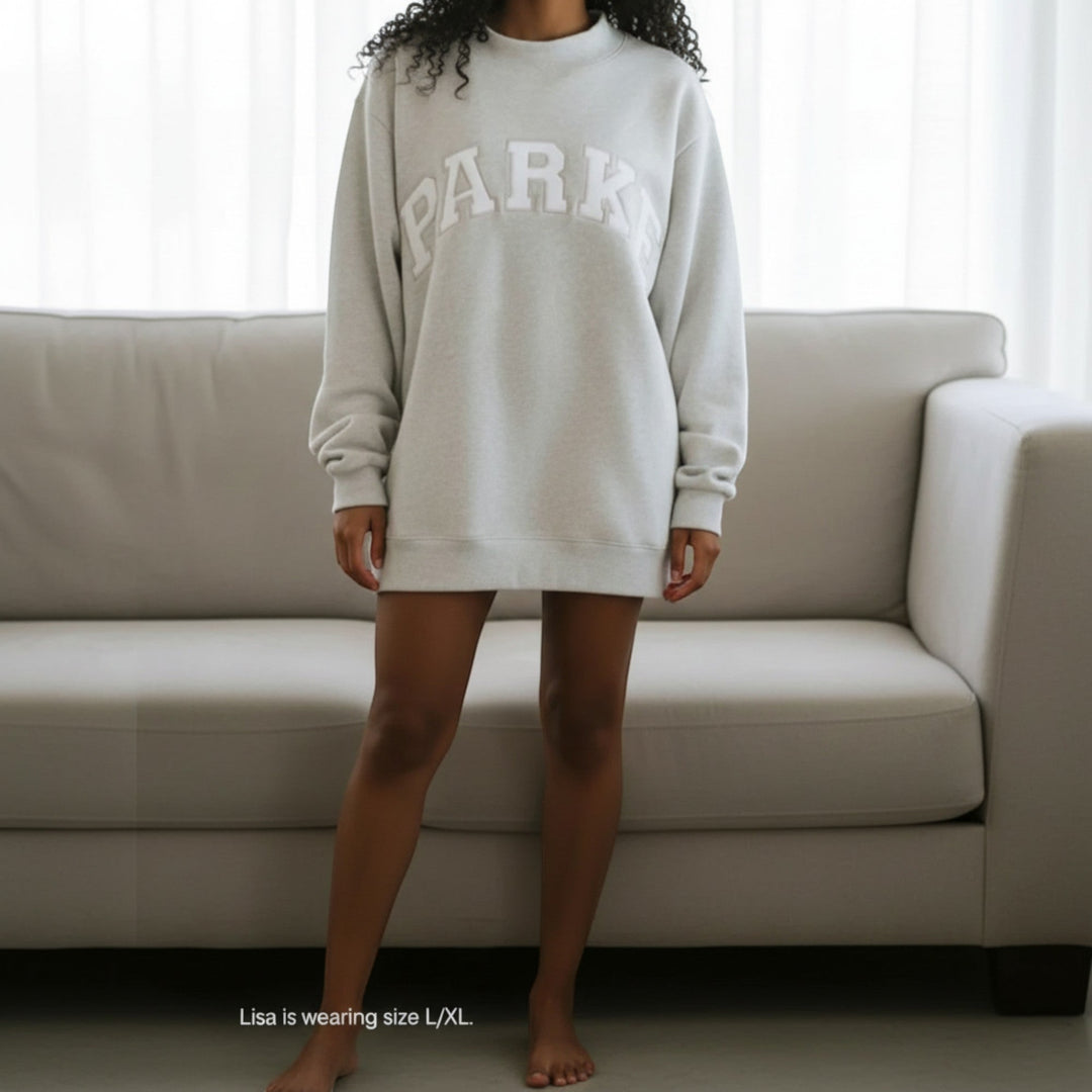 Relaxed fit women's varsity sweater, cozy, comfortable, and perfect for casual wear.