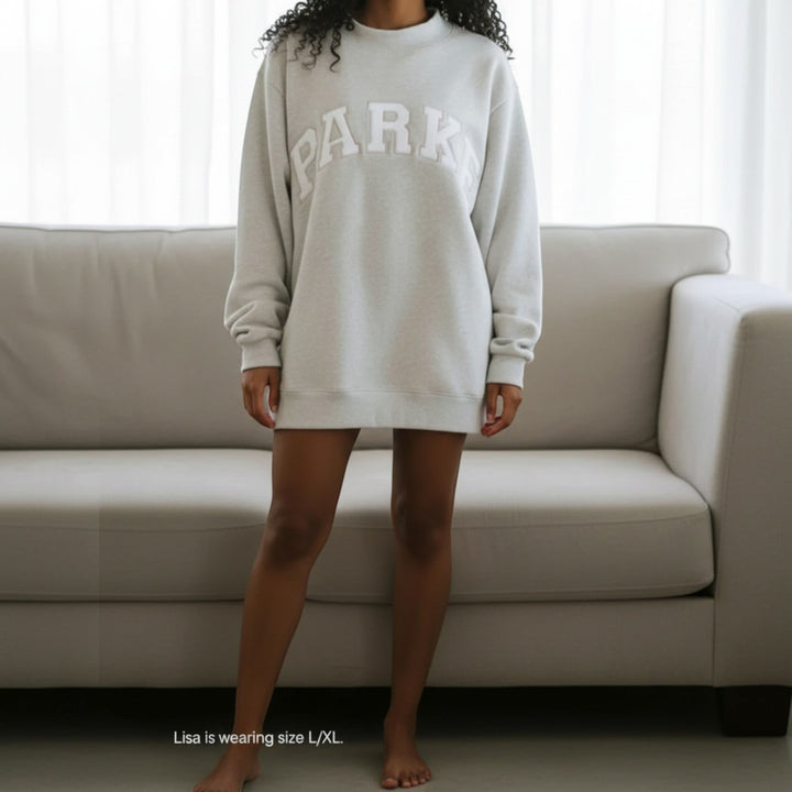 Relaxed fit women's varsity sweater, cozy, comfortable, and perfect for casual wear.
