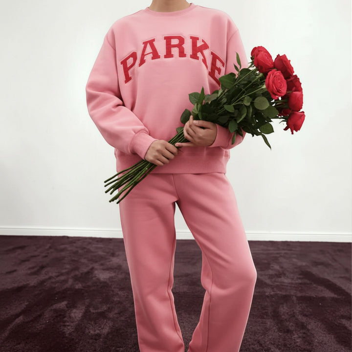 Stylish women's varsity hoodie, relaxed fit, perfect for everyday casual comfort.