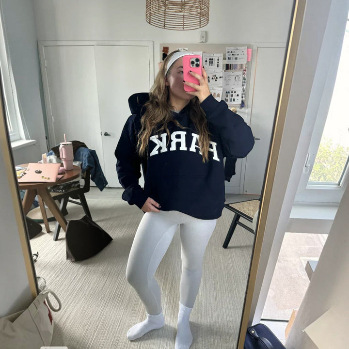 Collegiate style women's relaxed fit pullover hoodie, ideal for casual wear.