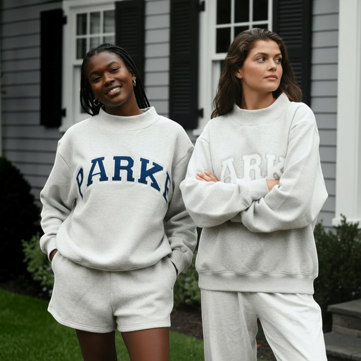 Women's oversized collegiate hoodie, comfortable relaxed fit for everyday wear.