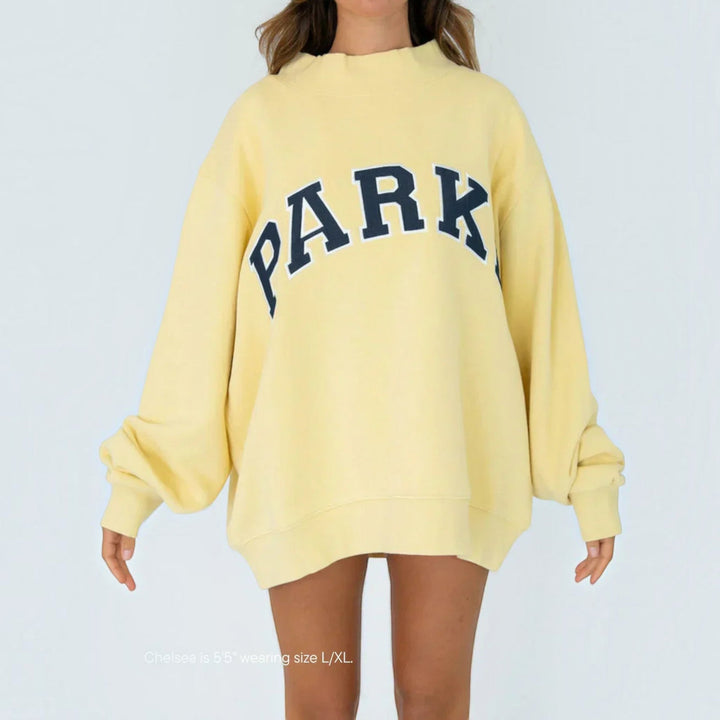 Women's varsity relaxed fit hoodie, a cozy pullover for everyday wear.