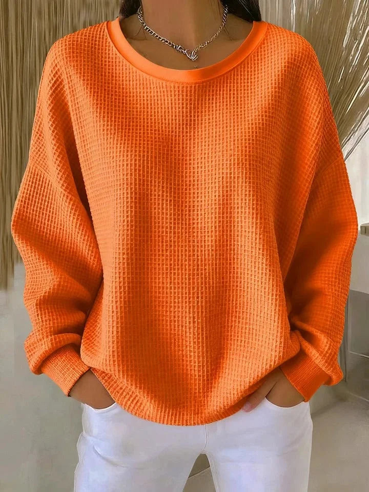 Casual women's waffle knit long sleeve sweater. Relaxed fit, comfortable & stylish for winter.