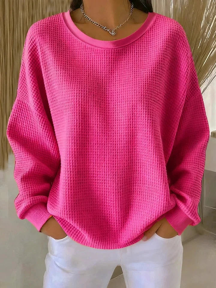Stylish women's relaxed fit waffle knit sweater. Long sleeve knit top, perfect for cozy everyday wear.