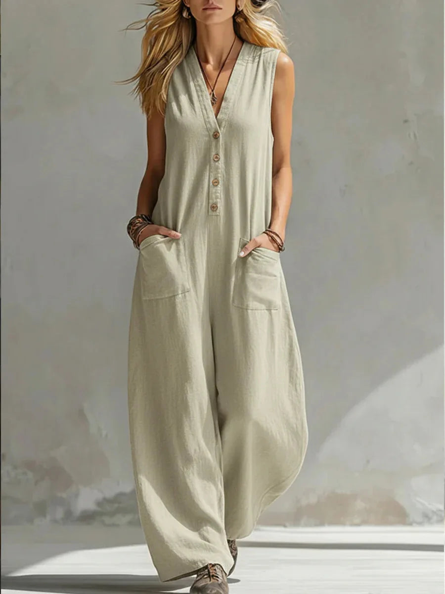 Sleeveless wide leg jumpsuit for women, featuring a relaxed fit, button front, and practical pockets.