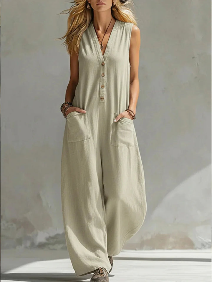 Sleeveless wide leg jumpsuit for women, featuring a relaxed fit, button front, and practical pockets.