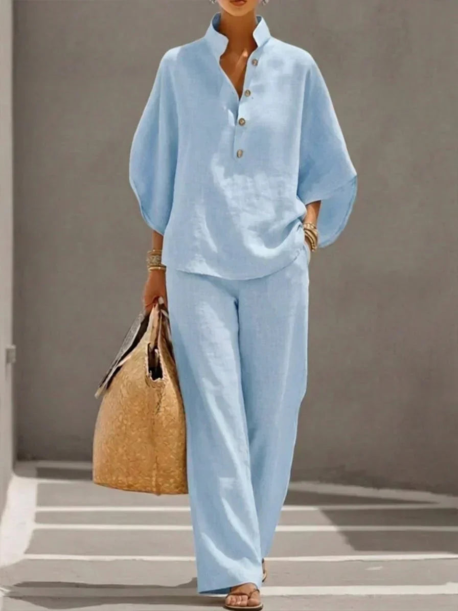 Comfortable women's linen two-piece outfit. Relaxed batwing sleeve top & wide-leg pants for spring/summer.