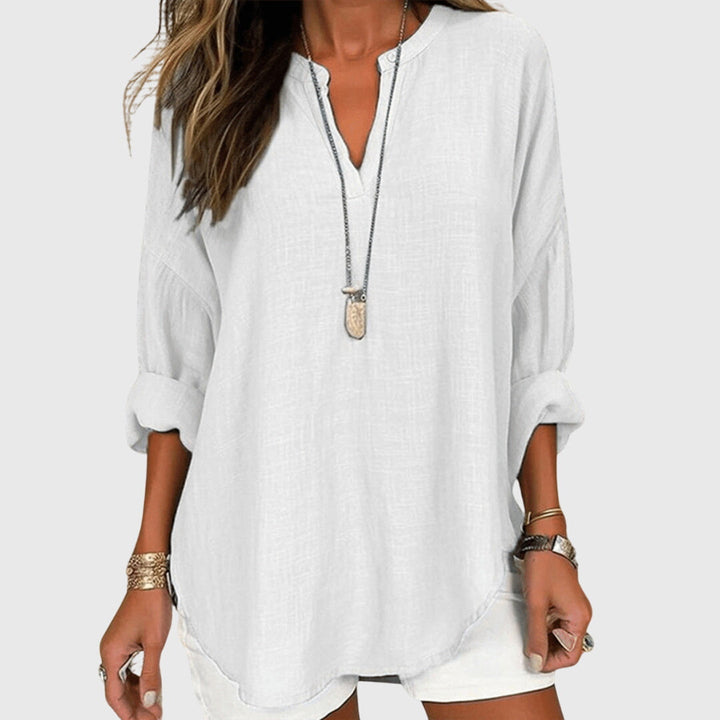 Loose fit women's long sleeve top, perfect for casual spring & summer outfits. Comfy everyday fashion.