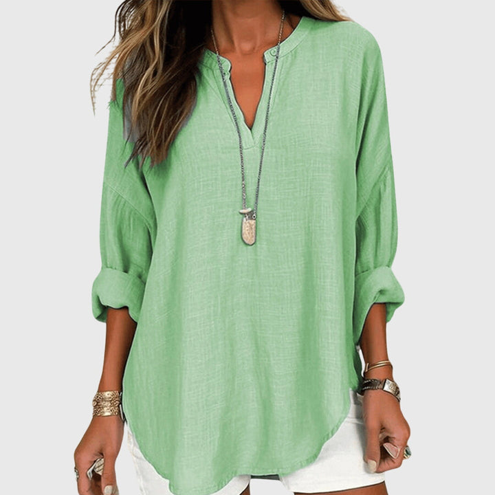 Versatile women's long sleeve top, great for daily wear & relaxed style. Lightweight & comfortable for spring.