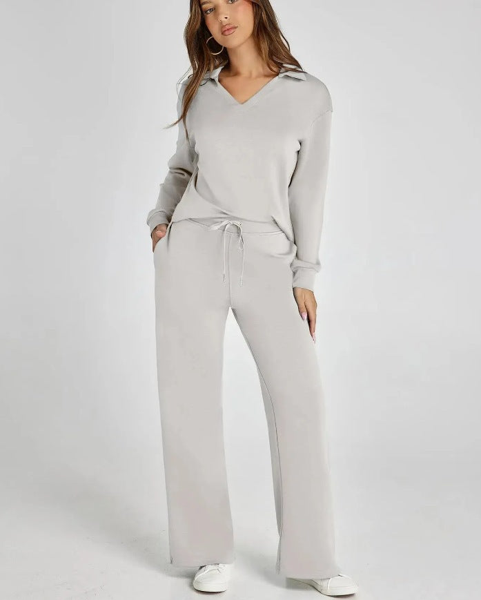 Soft women's two-piece lounge set, v-neck top & wide leg comfort pants. Ideal for relaxing & travel. Matching set style.