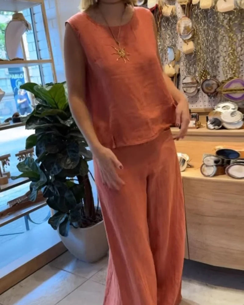 Bohemian women's matching set: relaxed sleeveless top & flowy wide-leg pants. Ideal for resort, vacation, or casual wear.