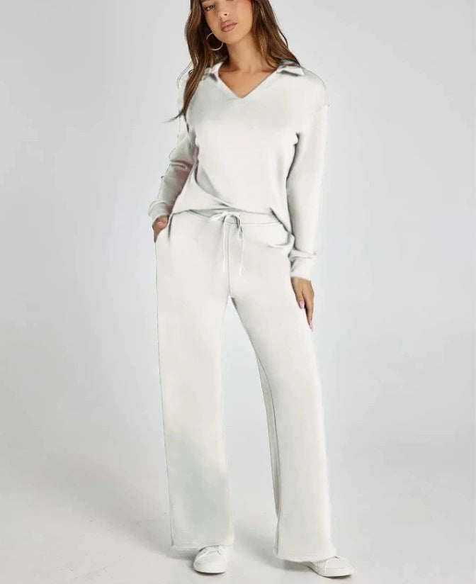 Versatile two-piece set for women. Zip-neck top & wide-leg pants, ideal for casual wear.