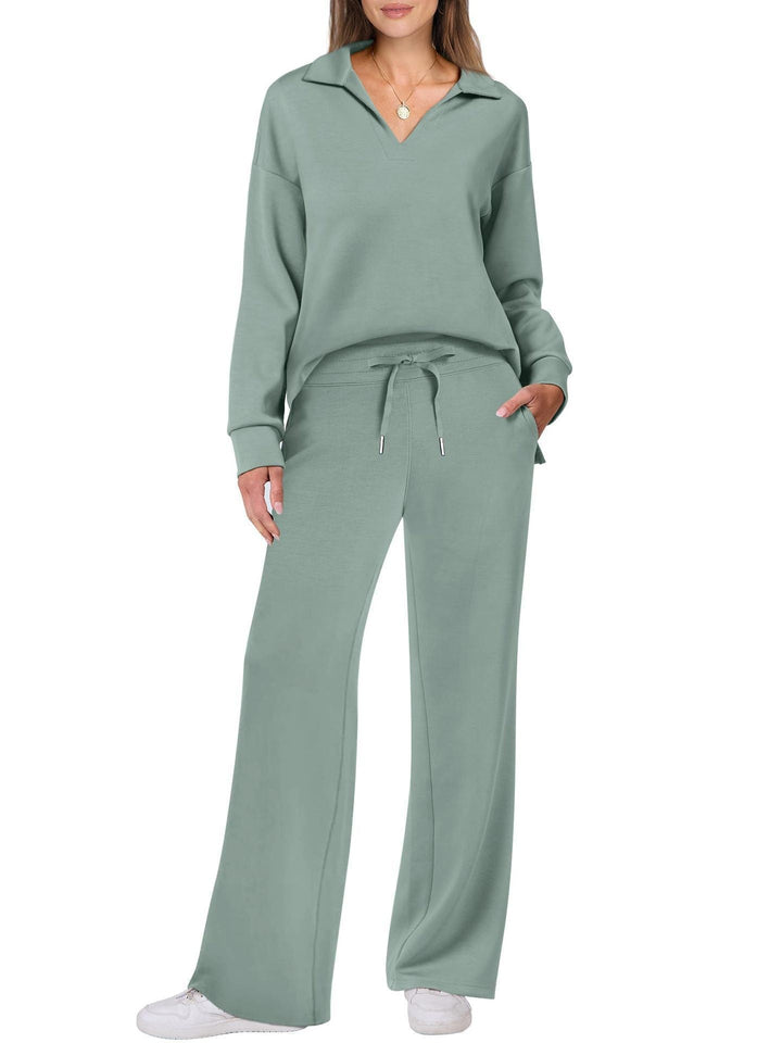 Elegant yet casual women's coordinated outfit. Zip-neck top & wide-leg trousers.