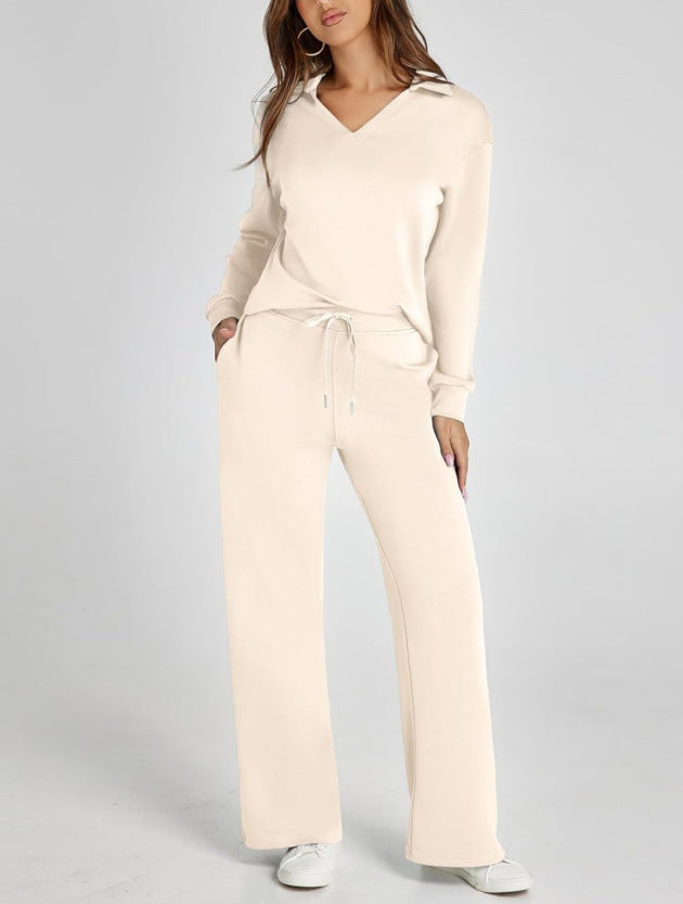Woman in relaxed zip-neck top & wide-leg casual set, perfect for home or errands.