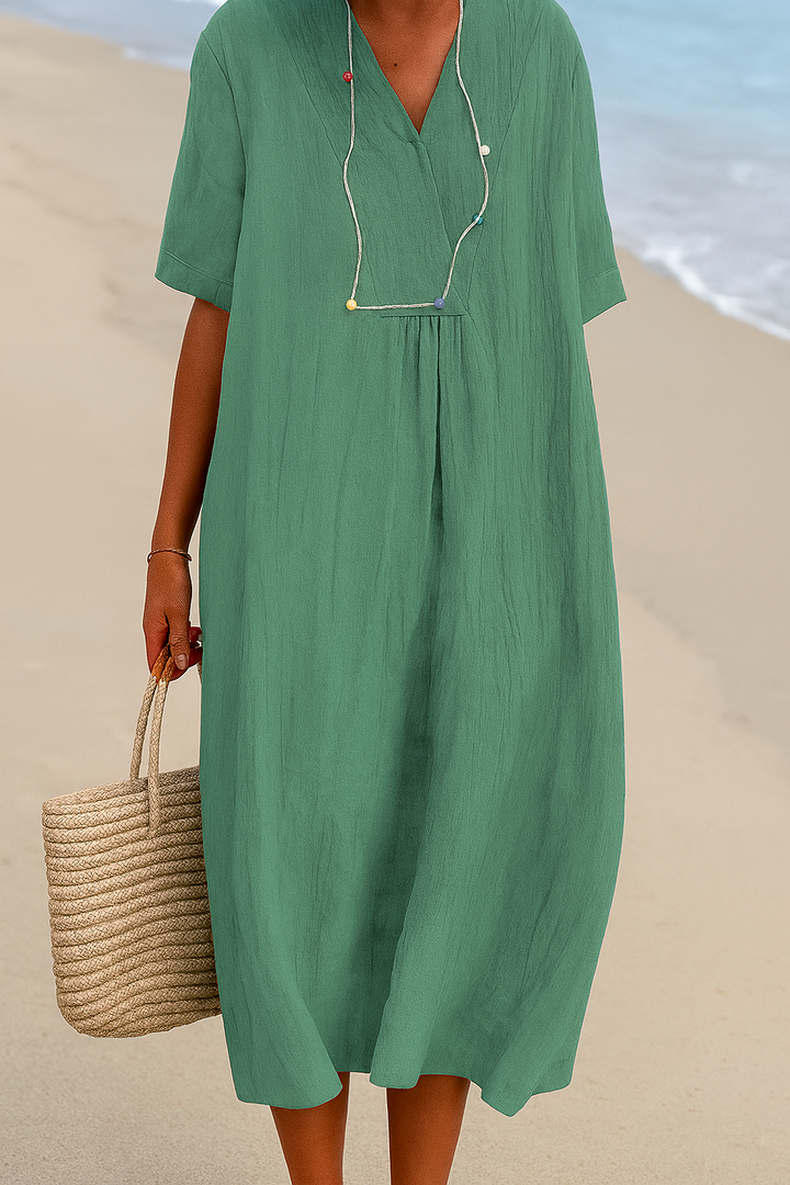 Casual women's relaxed fit V-neck short sleeve summer beach dress, perfect for lightweight comfort.