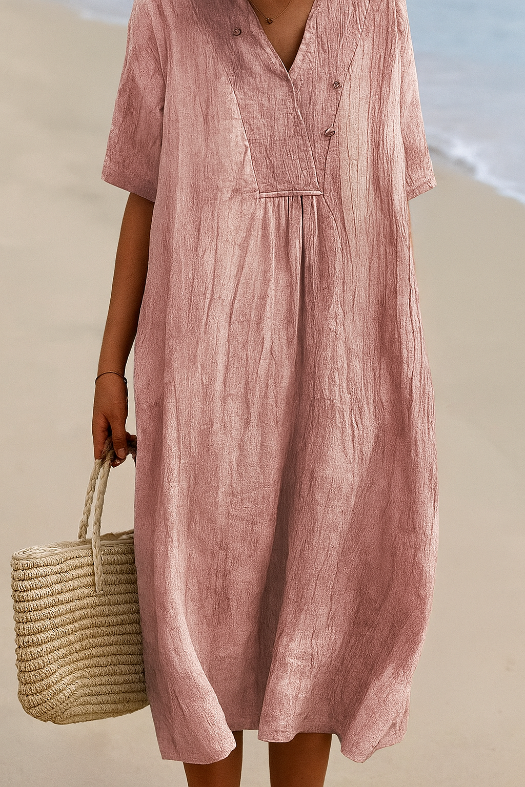 Lightweight women's relaxed fit V-neck short sleeve dress, ideal for summer beach or casual resort wear.