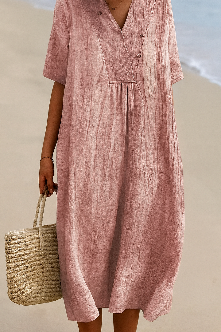 Lightweight women's relaxed fit V-neck short sleeve dress, ideal for summer beach or casual resort wear.