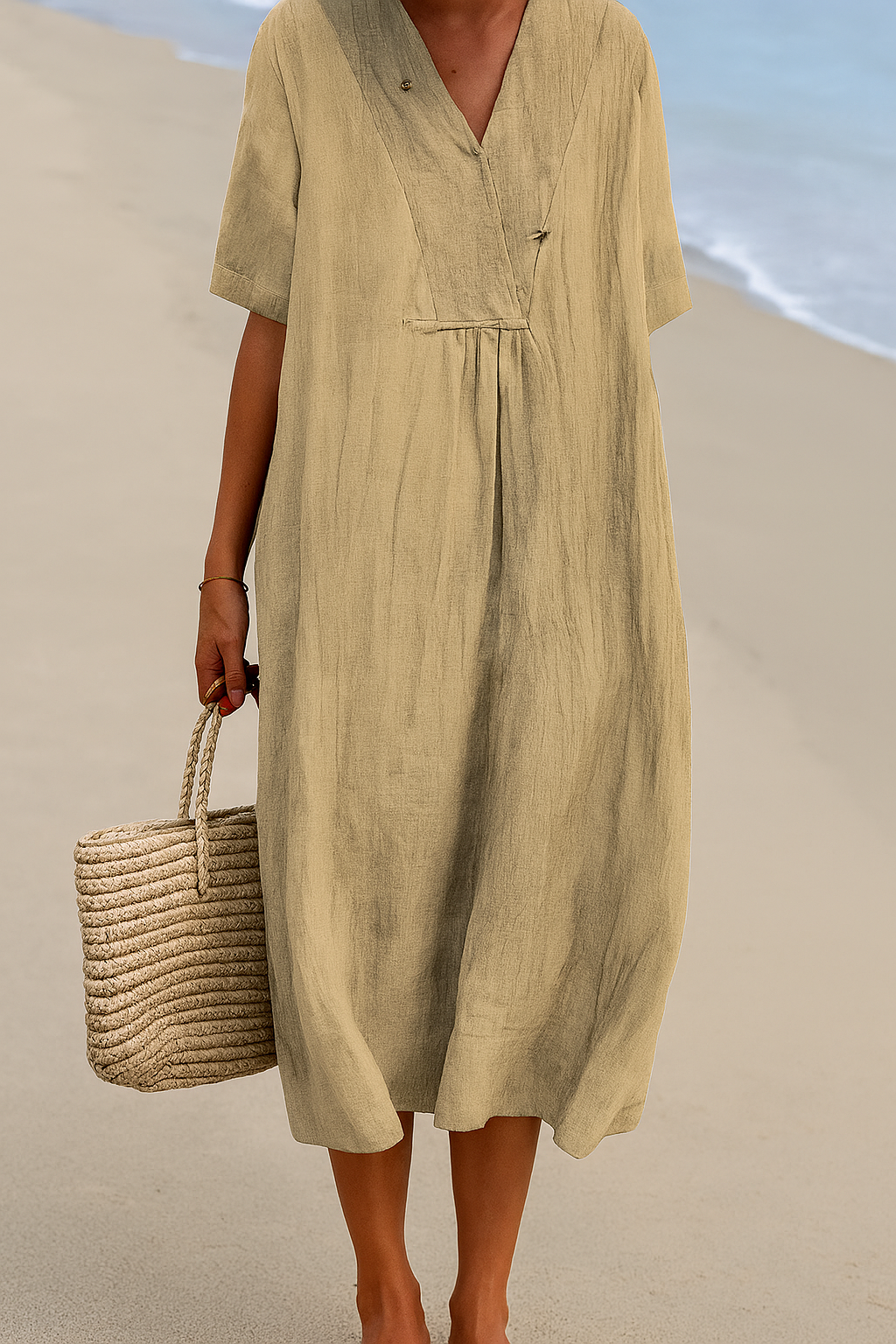 Stylish V-neck short sleeve women's beach dress, relaxed fit for summer vacations & casual resort wear.
