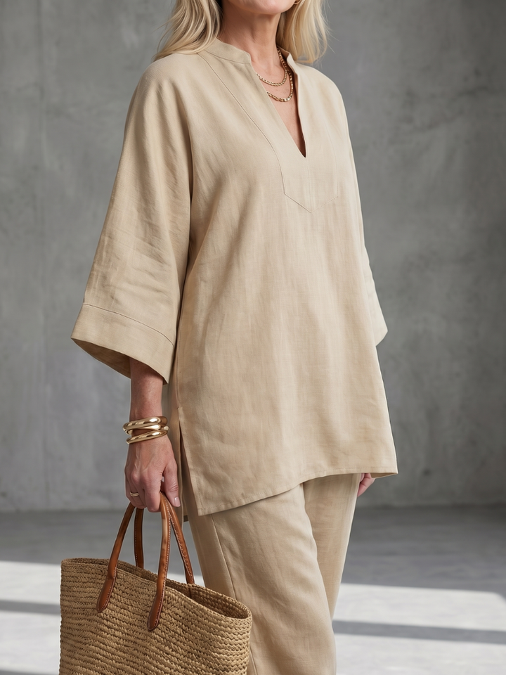 Chic women's comfort wear: V-neck tunic and gathered trouser fashion set.