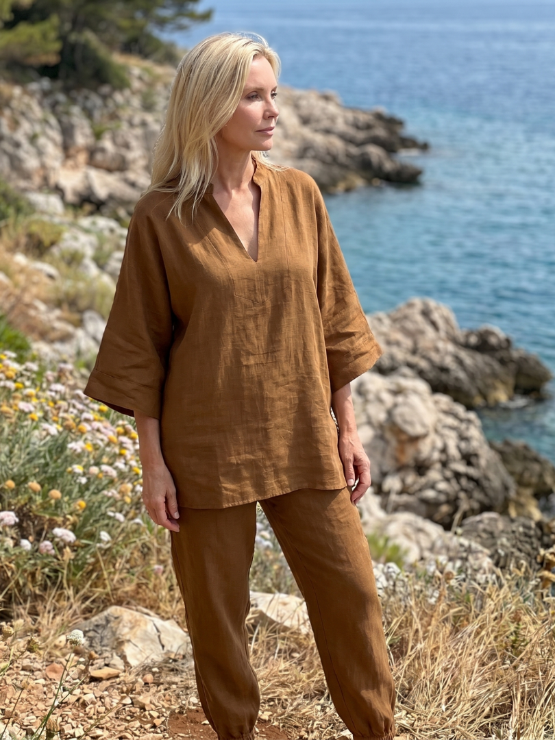 Women's relaxed V-neck top & gathered trouser set for versatile casual wear.