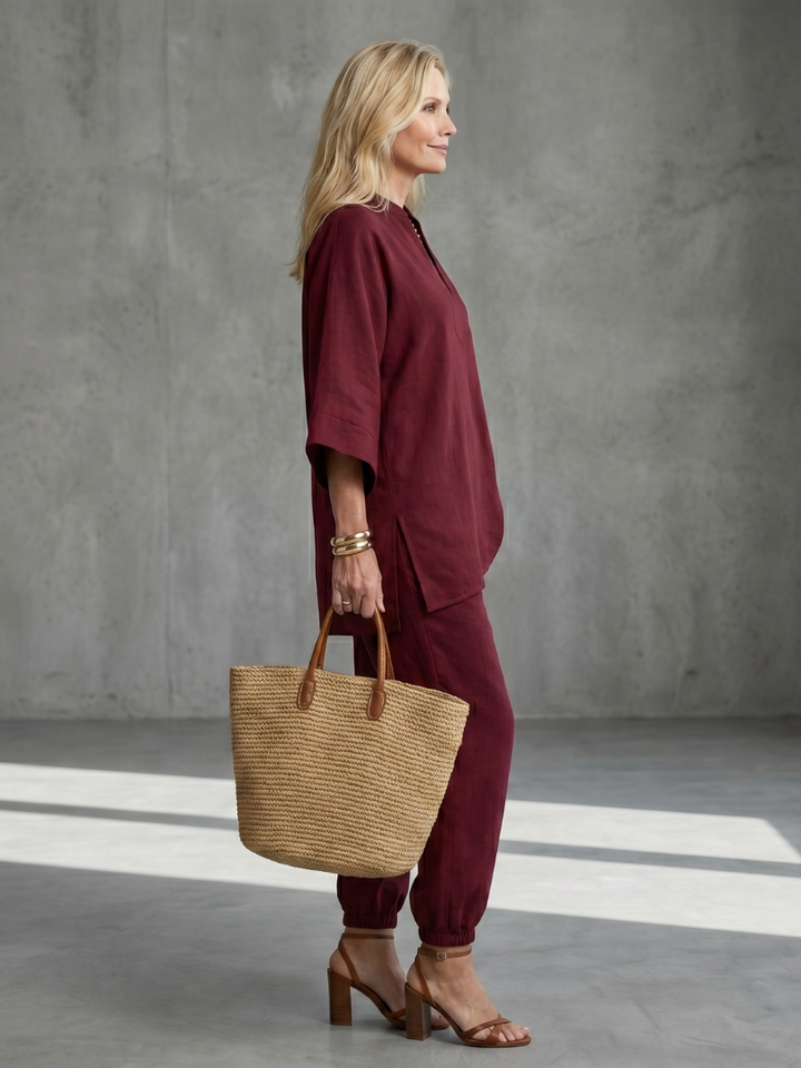 Elegant women's two-piece set featuring a relaxed V-neck tunic & gathered trousers.