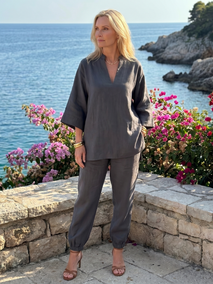 Women's relaxed V-neck tunic & gathered trouser set, perfect for lounging.